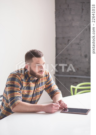 Businessman in board room Businessman in board room 22641018