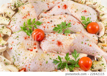 Raw chicken wings covered with spices for cooking Raw chicken wings covered with spices for cooking 22642115
