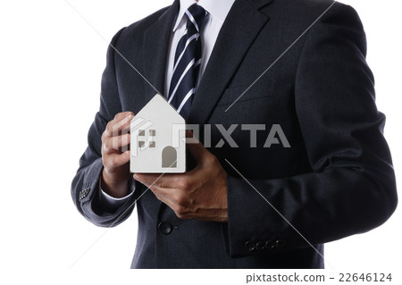 與房子模型的一個商人 22646124