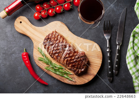 Grilled striploin steak and red wine 22648663