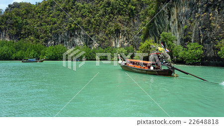 longtailboat in lagoon 22648818