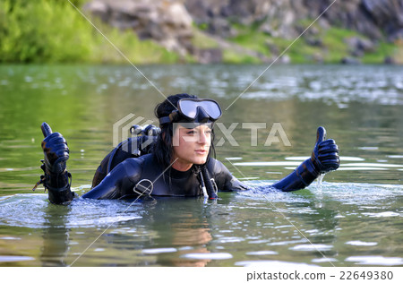 Beautiful woman diver making ok sign Beautiful woman diver making ok sign 22649380