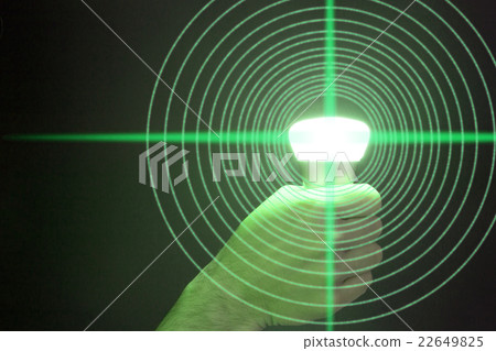 Hand holds a glowing green bulb emitting data 22649825