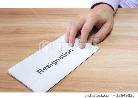 Businessman hands over a resignation letter Businessman hands over a resignation letter 22649826