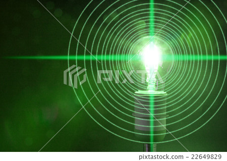 Glowing green bulb is emitting circular data Glowing green bulb is emitting circular data 22649829