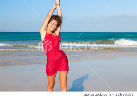 Young woman enjoing the beach Young woman enjoing the beach 22650198