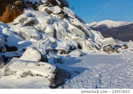 Huge icicles on rocks. Huge icicles on rocks. 22655643
