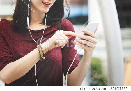 Woman Listening Music Media Entertainment Walking Concept Woman Listening Music Media Entertainment Walking Concept 22655781