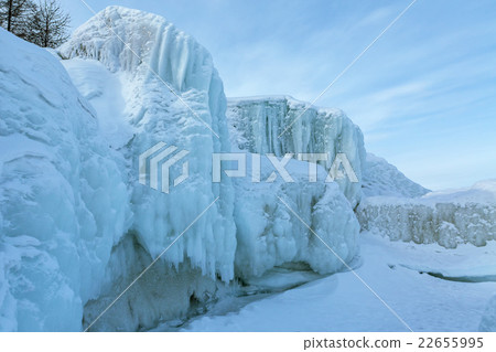Icy waves on beach of Lake Baikal near Turtle Rock Icy waves on beach of Lake Baikal near Turtle Rock 22655995