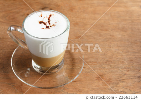 Hot Cappuccino Coffee on Wooden Table 22663114