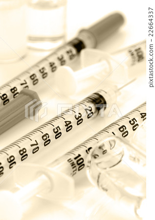 Insulin syringe on white background. Insulin syringe on white background. 22664337