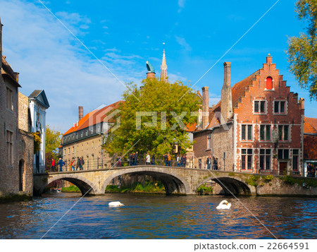 Water canal with old bridge and medieval houses of 22664591