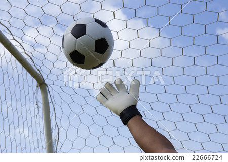 goalkeeper's hands reaching foot ball goalkeeper's hands reaching foot ball 22666724