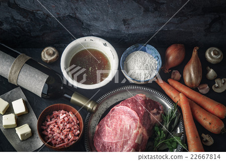 Ingredients for Boeuf Bourguignon on dark stone Ingredients for Boeuf Bourguignon on dark stone 22667814