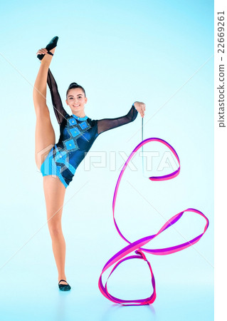 The girl doing gymnastics dance with colored The girl doing gymnastics dance with colored 22669261