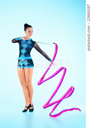 The girl doing gymnastics dance with colored 22669267