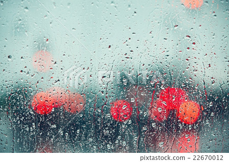 Raindrop on the window of the car Raindrop on the window of the car 22670012
