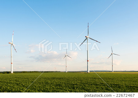 Wind turbines in front of a coal-fired plant Wind turbines in front of a coal-fired plant 22672467