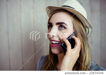 Pretty blonde woman on the phone 22674144