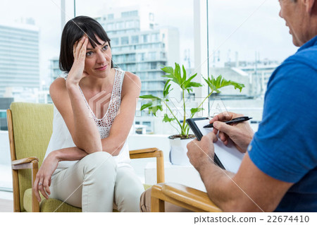 Woman consulting a therapist 22674410