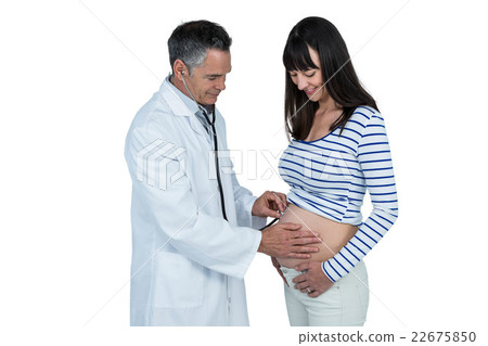 Doctor examining pregnant woman Doctor examining pregnant woman 22675850