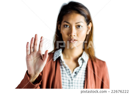 Serious businesswoman showing her hand 22676222