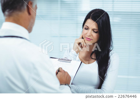 Pregnant woman interacting with doctor Pregnant woman interacting with doctor 22676446
