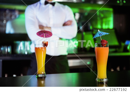 Two glasses of cocktail on bar counter Two glasses of cocktail on bar counter 22677192