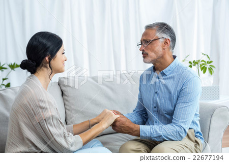 Man and woman holding hands Man and woman holding hands 22677194