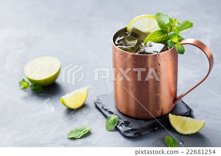 Cold Moscow Mules cocktail ginger beer vodka, lime Cold Moscow Mules cocktail ginger beer vodka, lime 22681254