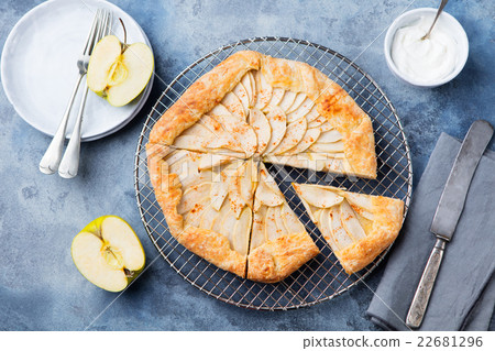 Apple galette, pie, tart with cinnamon Top view Apple galette, pie, tart with cinnamon Top view 22681296
