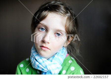 Indoor picture of diseased sad kid girl in scarf  22682157