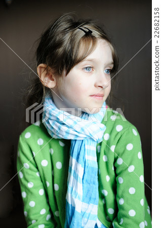 Indoor picture of diseased sad kid girl in scarf  22682158