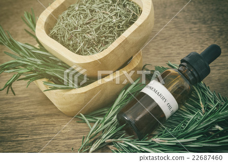 Rosemary essential oil in bottle 22687460