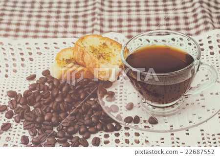 Cup of coffee and homemade garlic bread Cup of coffee and homemade garlic bread 22687552