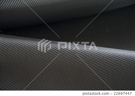 Carbon fiber composite raw material background 22697447