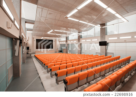 empty chairs in theatre or conference hall. Orange 22698916