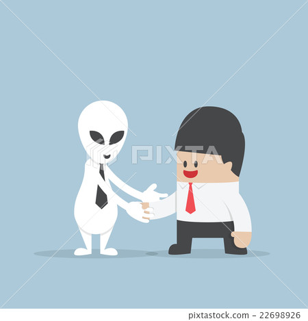 Businessman shaking hands with Alien Businessman shaking hands with Alien 22698926