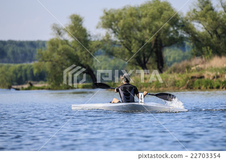young athlete on a kayak young athlete on a kayak 22703354