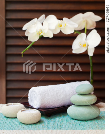 Spa and wellness massage setting Candle and stones 22706645