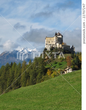 Castle Tarasp and forest in autumn Castle Tarasp and forest in autumn 22707247