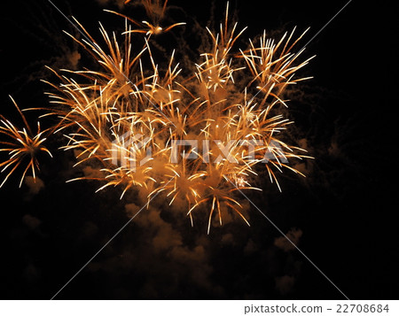 A lot of orange fireworks spreading radially out of the Jingu Gaien Fireworks display A lot of orange fireworks spreading radially out of the Jingu Gaien Fireworks display 22708684