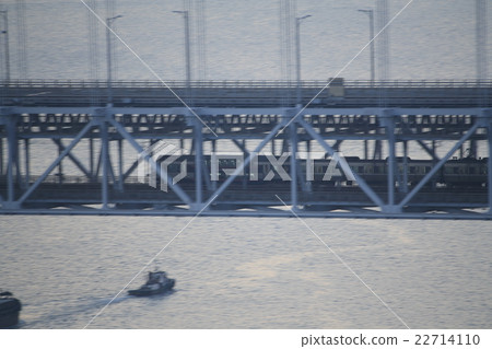 Rapid marine liner crossing the Seto Ohashi bridge in the evening (follow shot) 22714110