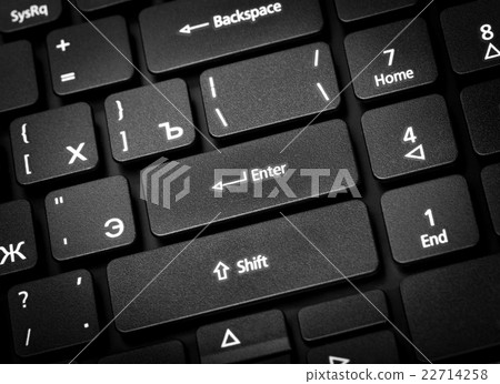 Laptop keyboard. The focus on the Enter key. 22714258