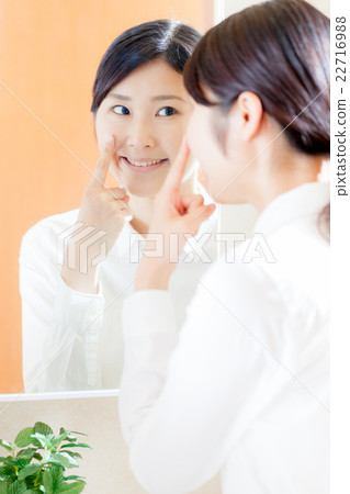 Skin-care woman, mirror 22716988