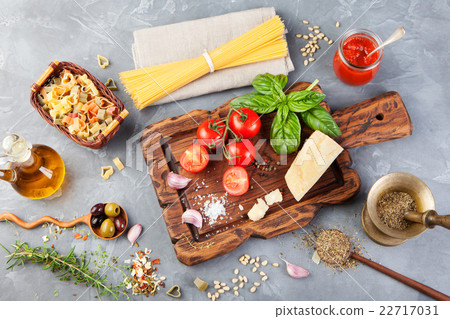Italian food background tomatoes, basil, spaghetti 22717031