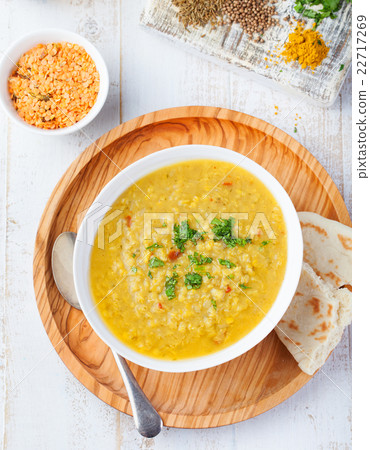 Lentil soup with bread in ceramic bowl Top view. 22717269