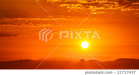 Sunset Sunrise Over Dark Mountain Silhouette 22717437