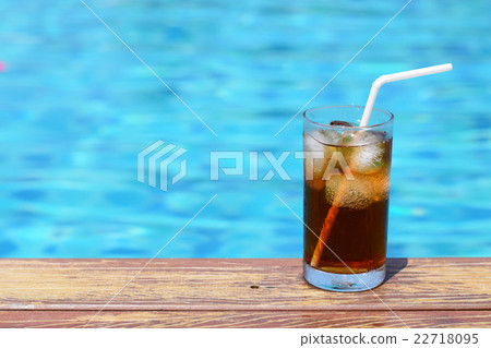 A glass of ice cola at pool with vintage filter A glass of ice cola at pool with vintage filter 22718095