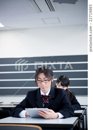 Girls high school students who take classes using tablet computers Girls high school students who take classes using tablet computers 22719865